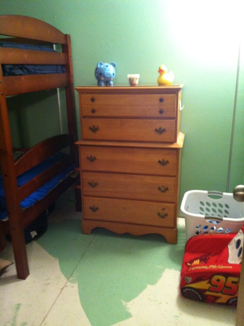 Noah's dresser - he can reach the bottom three drawers and pull out the bottom two drawers. 